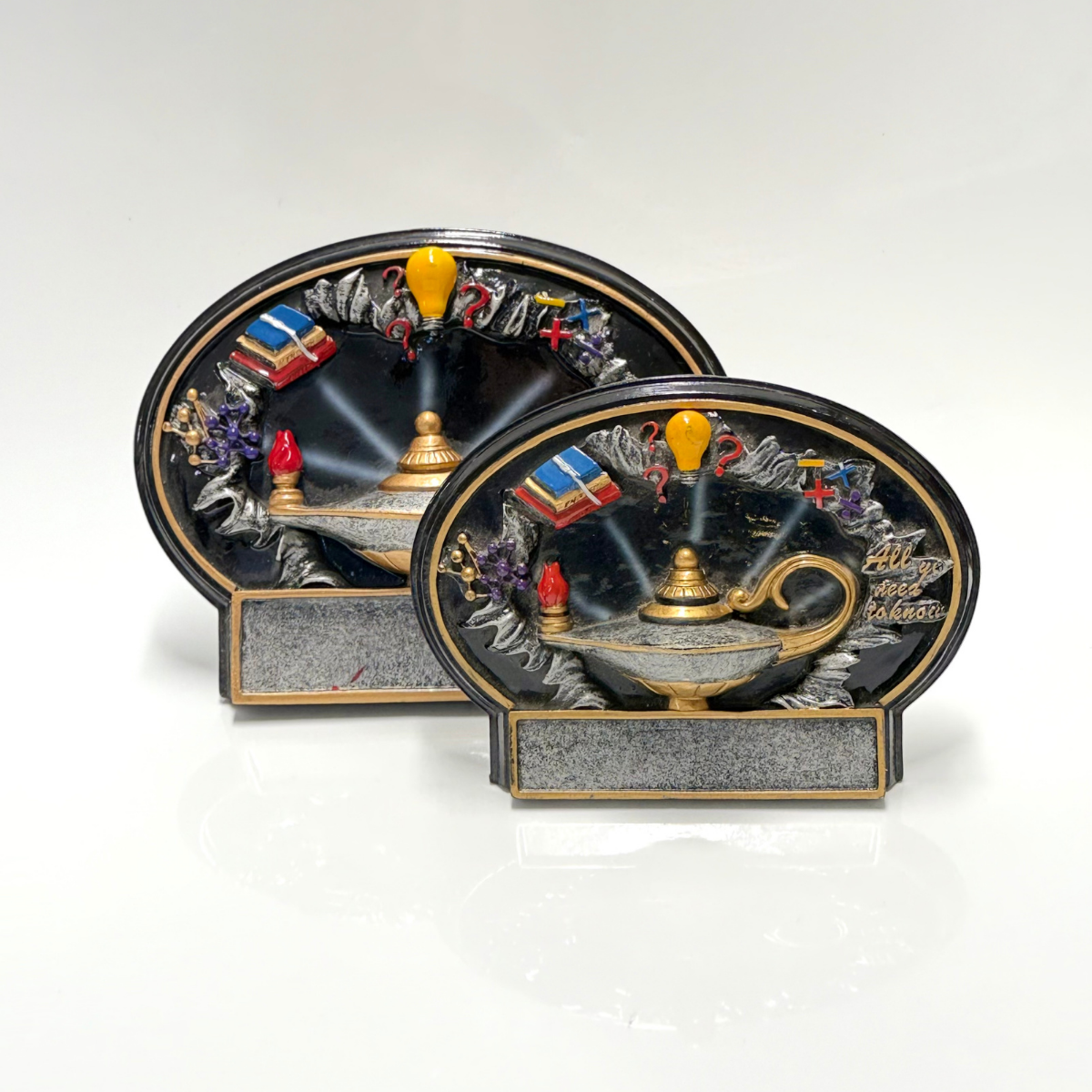 Trofeo Lampara y Libro negra